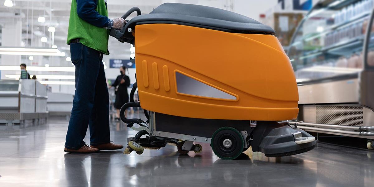 cleaning floor with machine